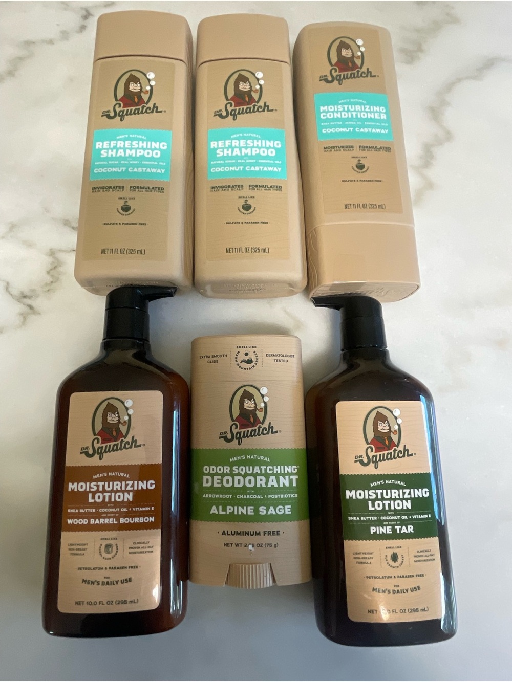 Lot of 6 new Dr squatch items. Shampoo, conditioner, deodorant, lotion.